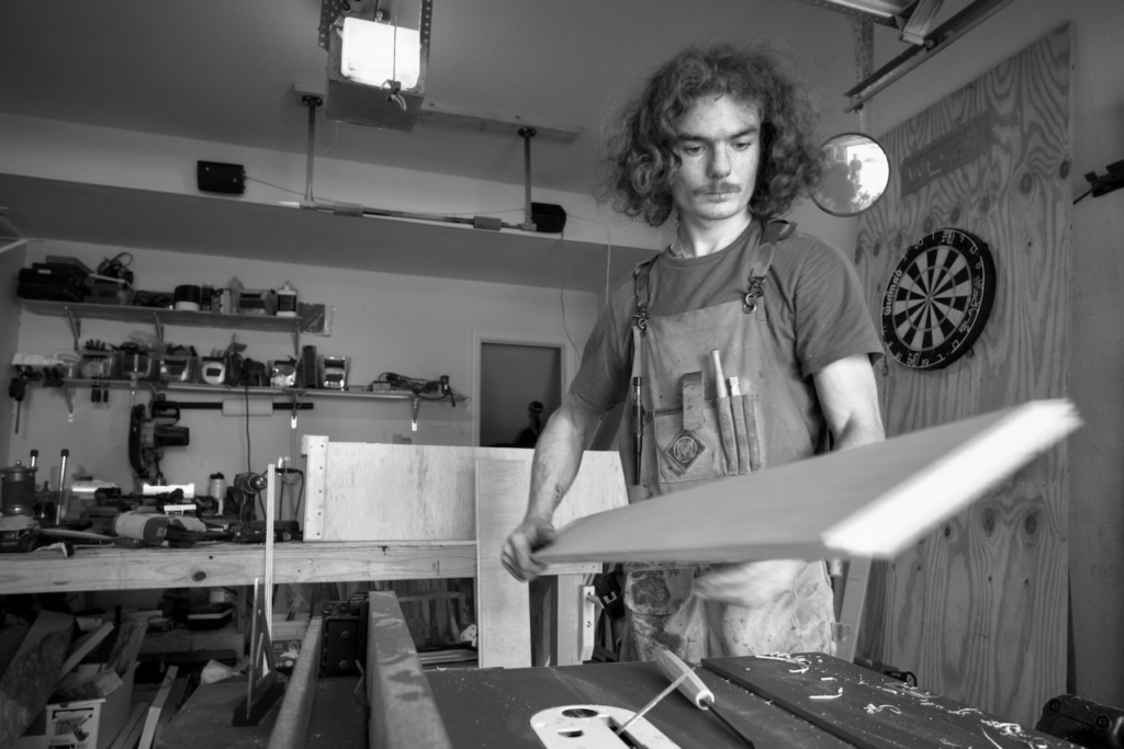 Thomas at work in the garage, building a box